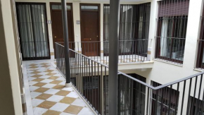 Отель LyriosHomes Apartamentos Los Tréboles  Малага